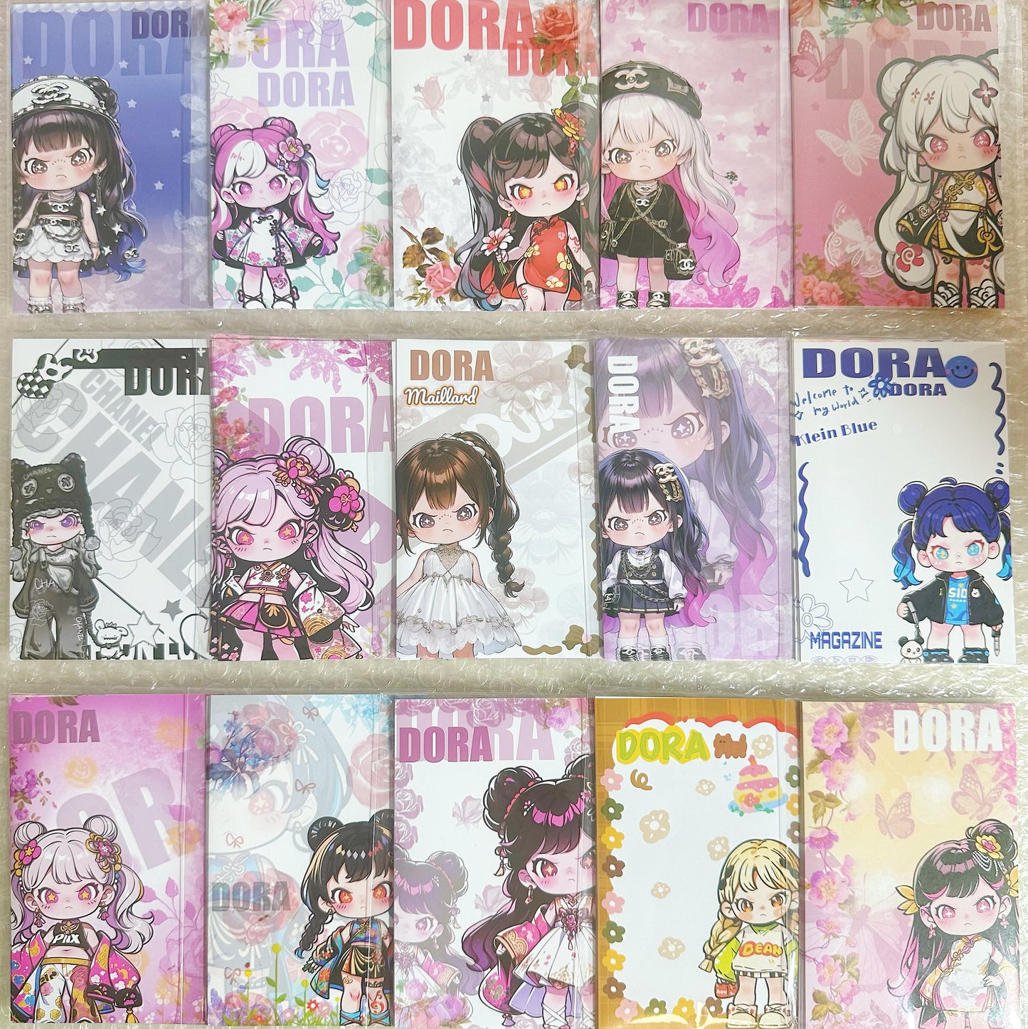 「G001ステッカーゲーム」   【おしん＋さんのりお】【SP】【LABUBU】【DORA】【ミックス】3999/5冊+ 一回のコリントゲーム（ランダムで2、3、4冊をゲット）  シークレット率：45%  - 8×12cmサイズ、10枚入り  「当たる最低12本、足りない場合は補充します。」【バインダー対象】